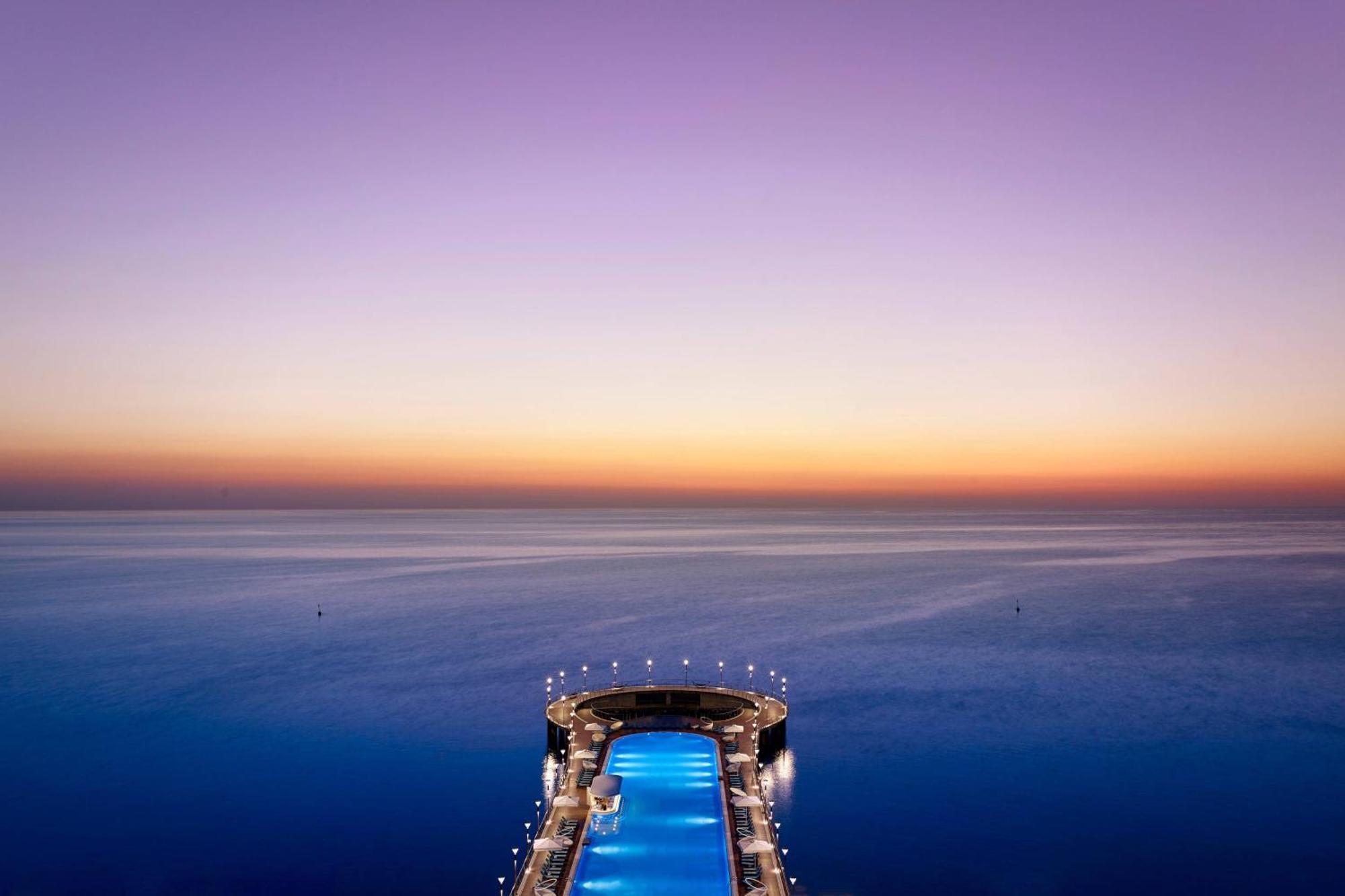Paragraph Resort & Spa Shekvetili, Autograph Collection Exterior foto The pier at sunset
